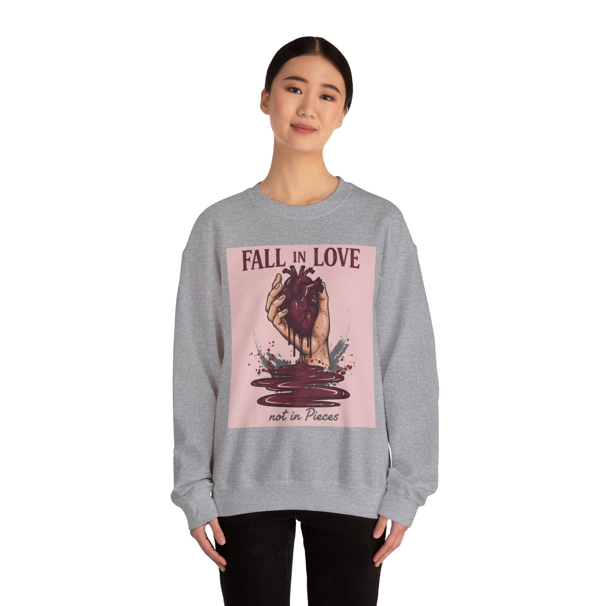 Crewneck Sweatshirt — "Fall in Love Not in Pieces" Heart Graphic