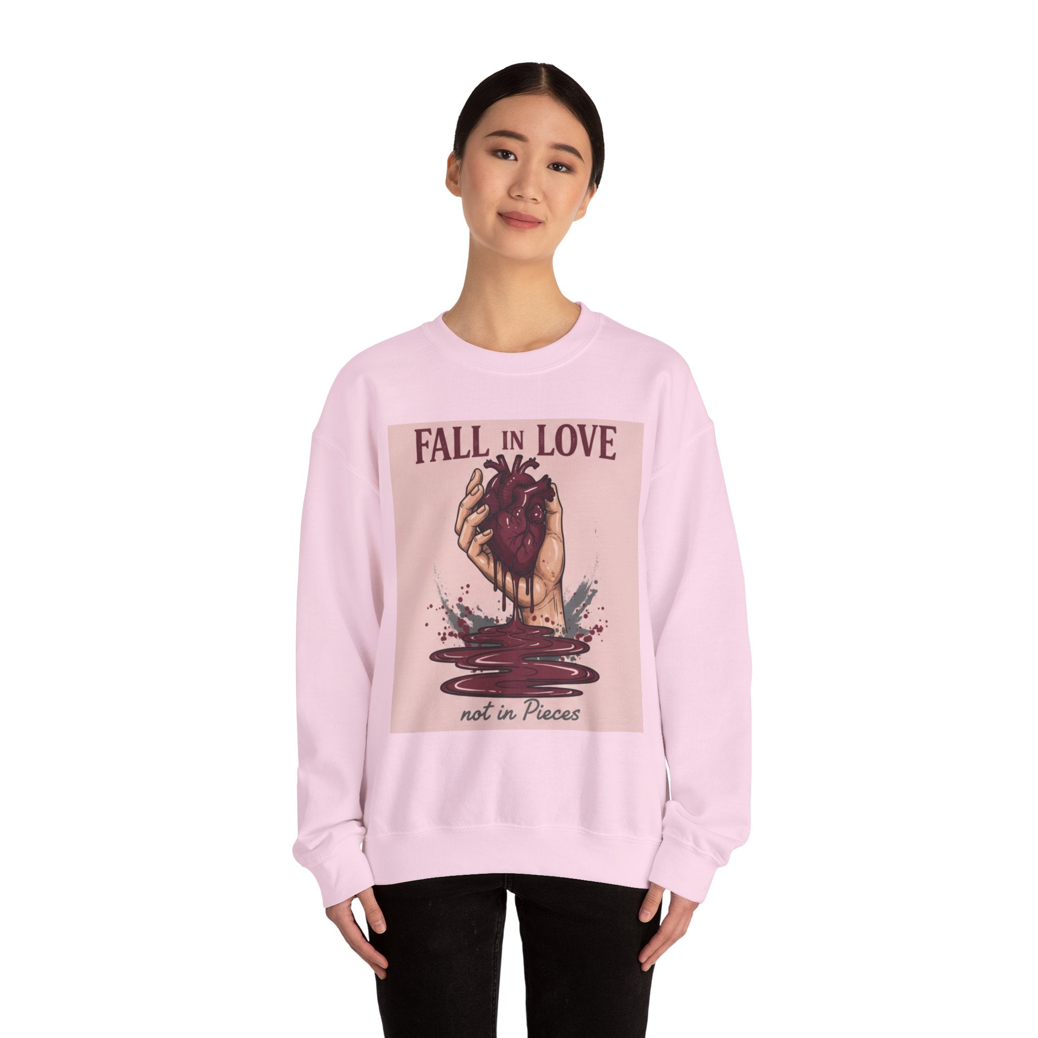 Crewneck Sweatshirt — "Fall in Love Not in Pieces" Heart Graphic